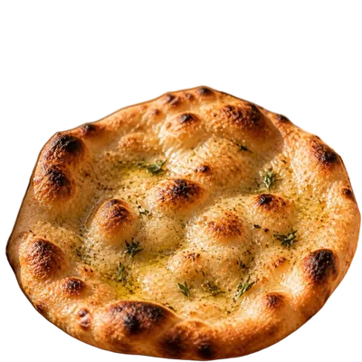 A personal flatbread crust blistered from the oven, herbs scattered over it.
